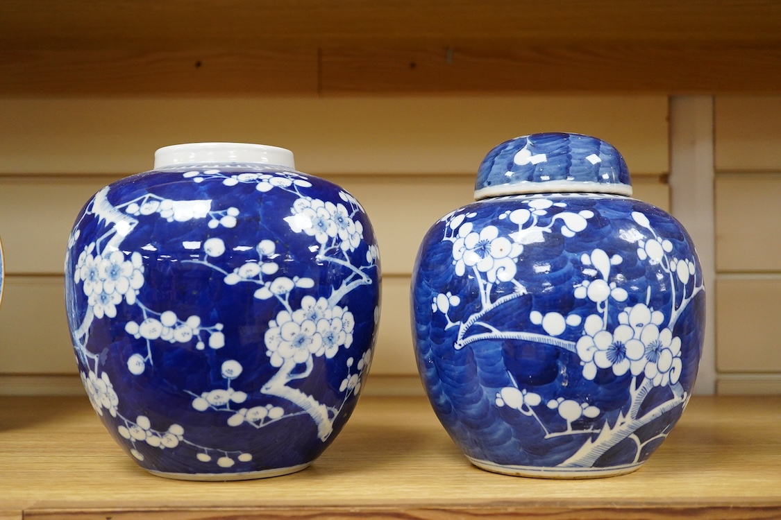 Two Chinese Prunus flower ginger jars, one with cover, 20cm high